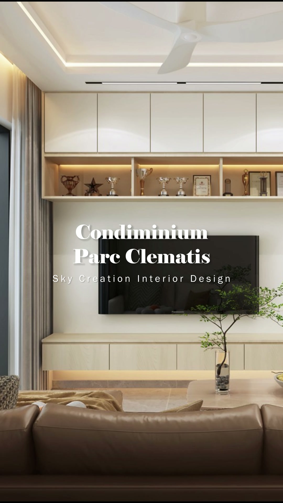Parc Clematis living room with a pale television wall and warm display lighting