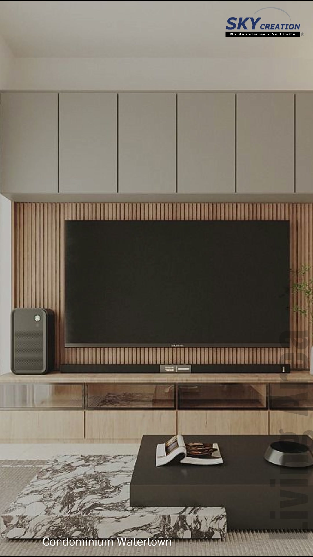 Watertown centred television above a long console with dark and pale timber drawers