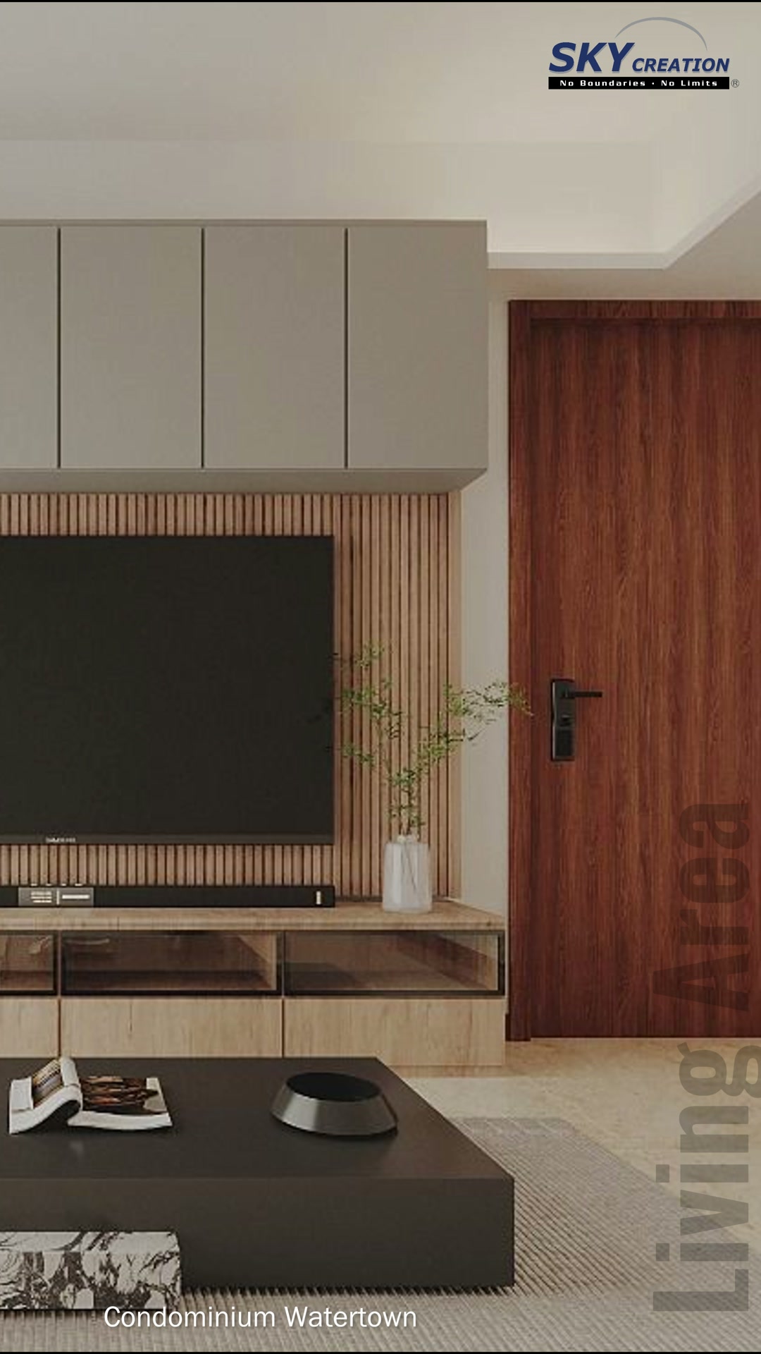 Watertown two-tone television console below the grey upper cabinet bank