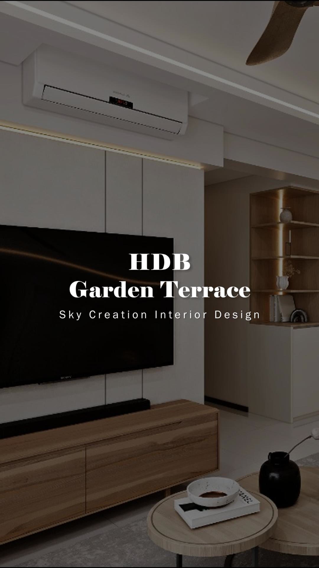 Original HDB Garden Terrace 3D cover showing the pale television wall, timber console and warm illuminated display tower