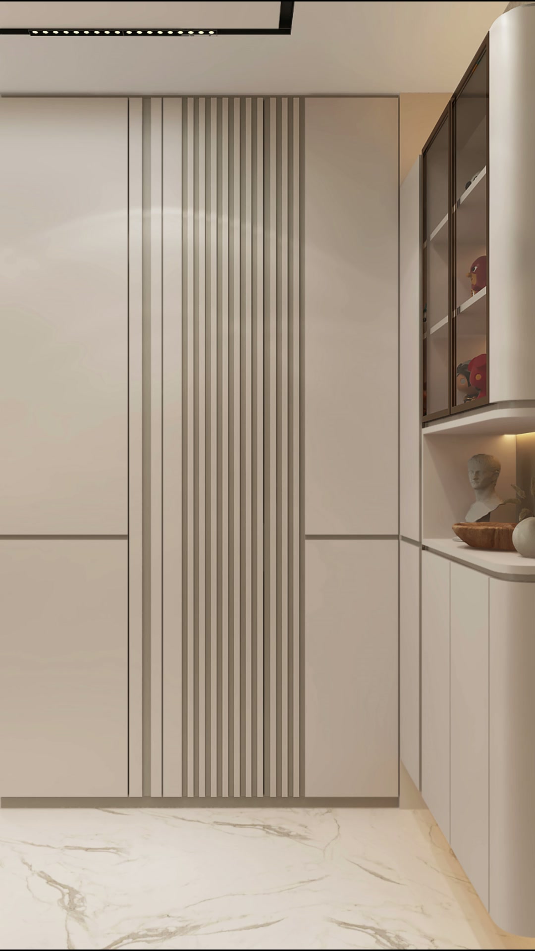 Esparina Residences entrance with full-height pale storage, vertical fluting and an illuminated display return