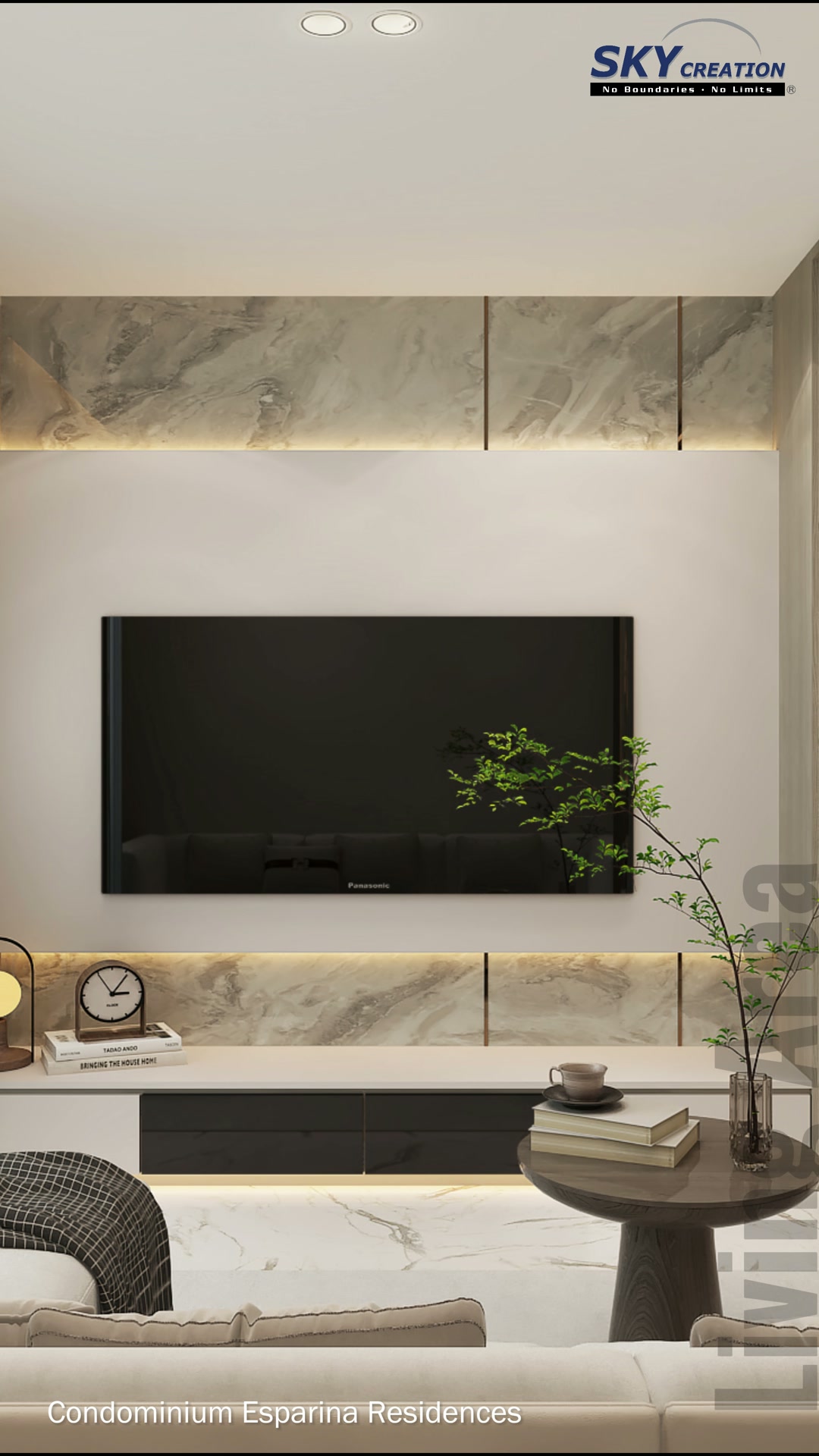 Esparina Residences living room with marble-look television panels, a low console and illuminated shelving
