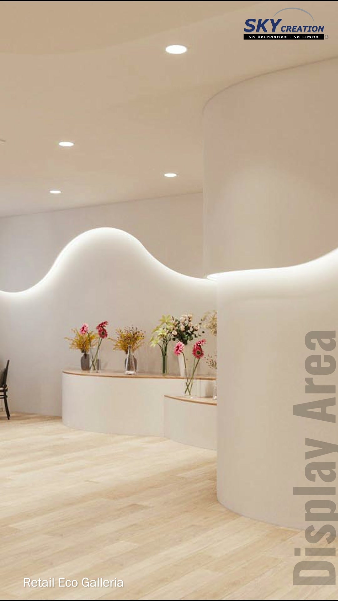 Eco Galleria curved flower display with wave-shaped cove lighting and a pale timber floor