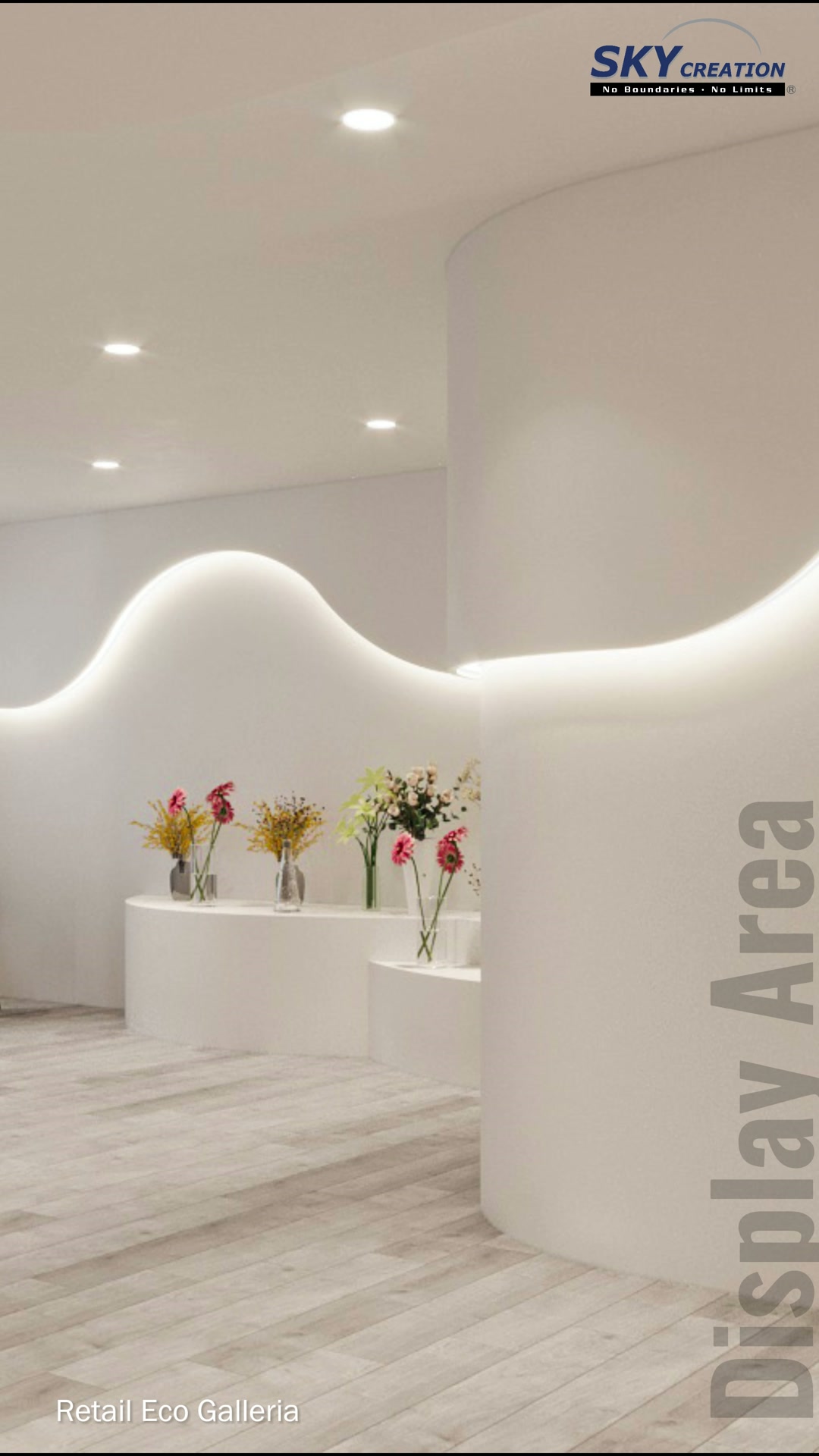 Eco Galleria curved display area with tiered plinths and concealed wave lighting