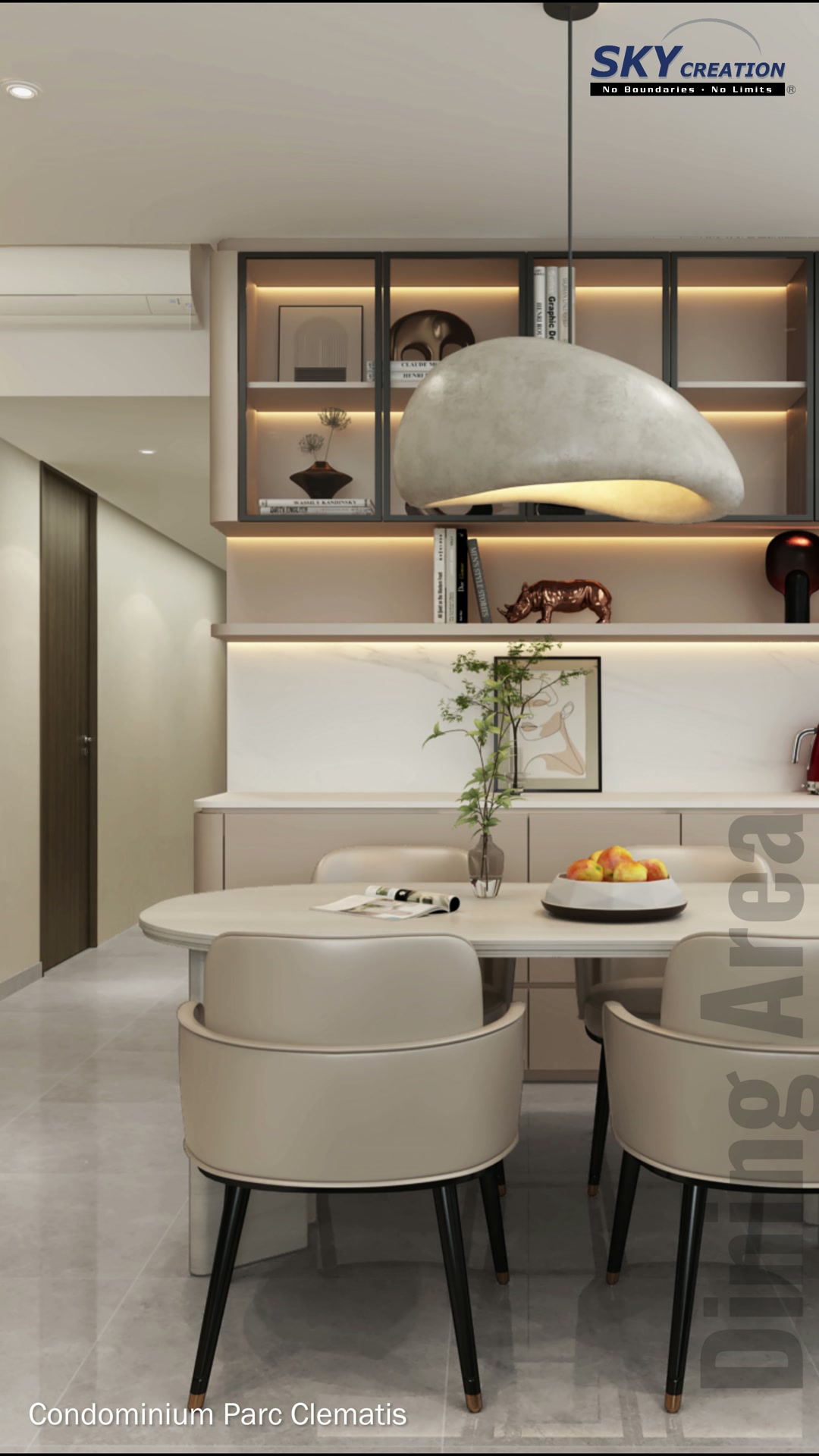 Parc Clematis dining area with rounded pale cabinetry, black-framed displays and a stone-look pendant