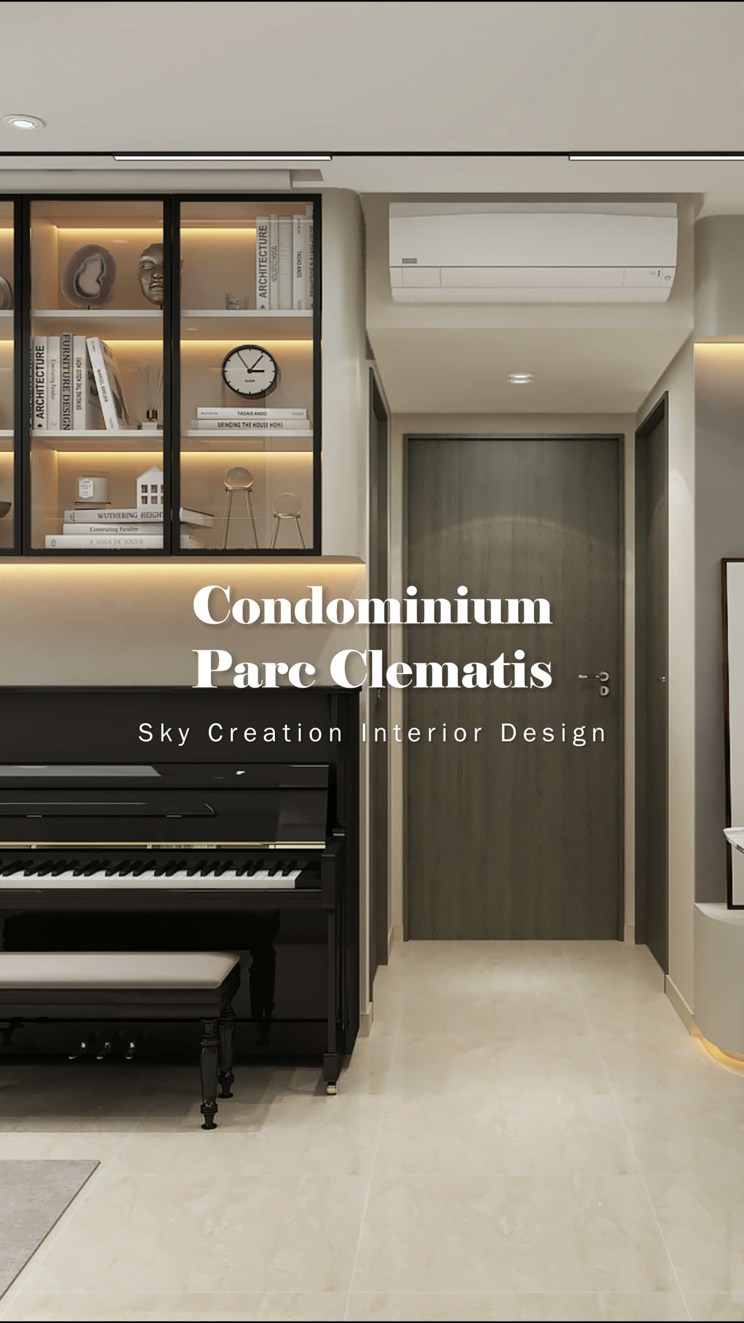 Parc Clematis entrance with a black piano below illuminated glass-front display cabinets