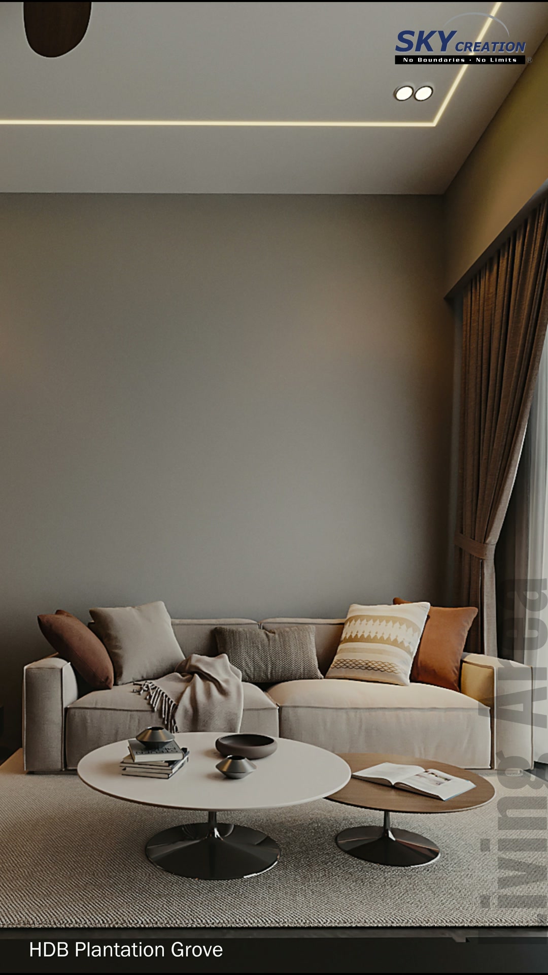 Plantation Grove living area with a pale sofa, rounded coffee tables and warm perimeter lighting