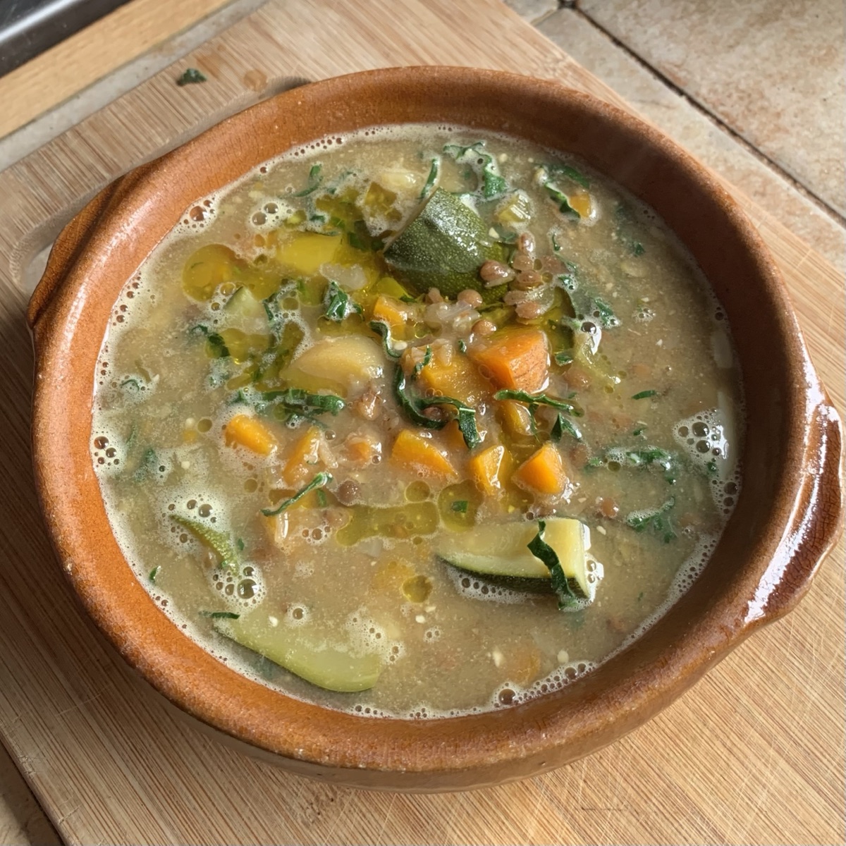 A bowl of chunky lentil and vegetable soup