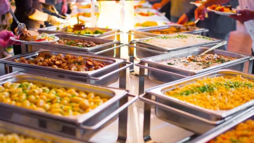 Buffet setup with various dishes 1024x576 1