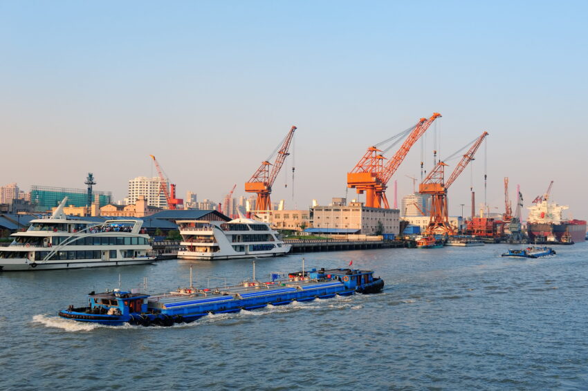 boat huangpu river with shanghai urban architecture cargo crane 1