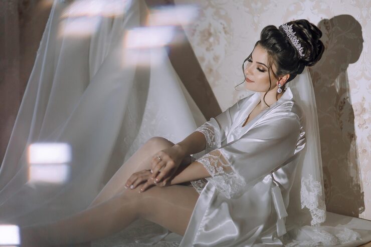woman white gown sits bed 964739 26620