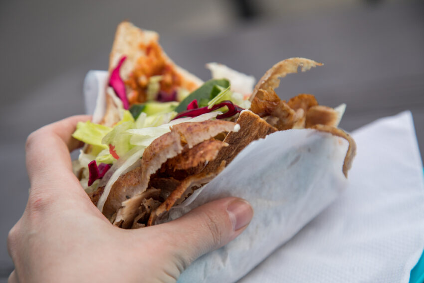 women eating donner kabab