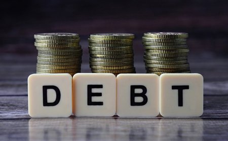 Finance Minister Visits Spain for Debt Relief Talks