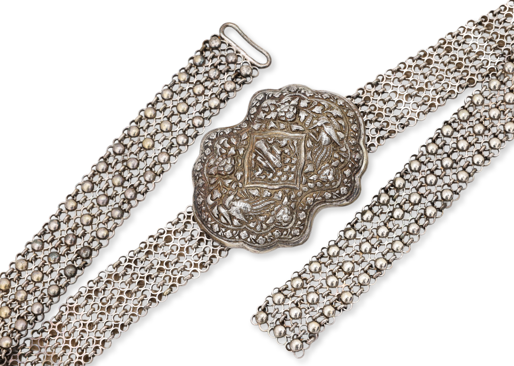 A SILVER BELT AND BUCKLE