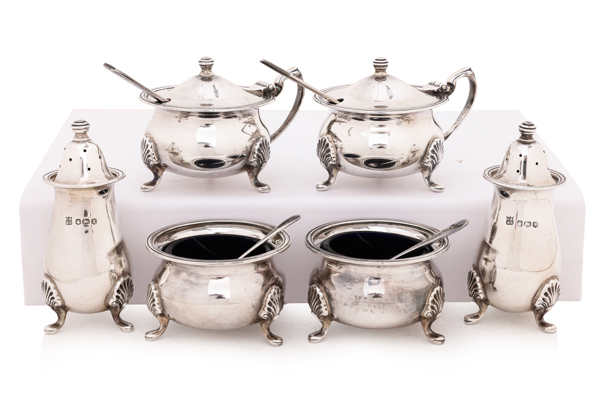 AN ENGLISH STERLING SILVER SIX PIECE CONDIMENT SET (6)