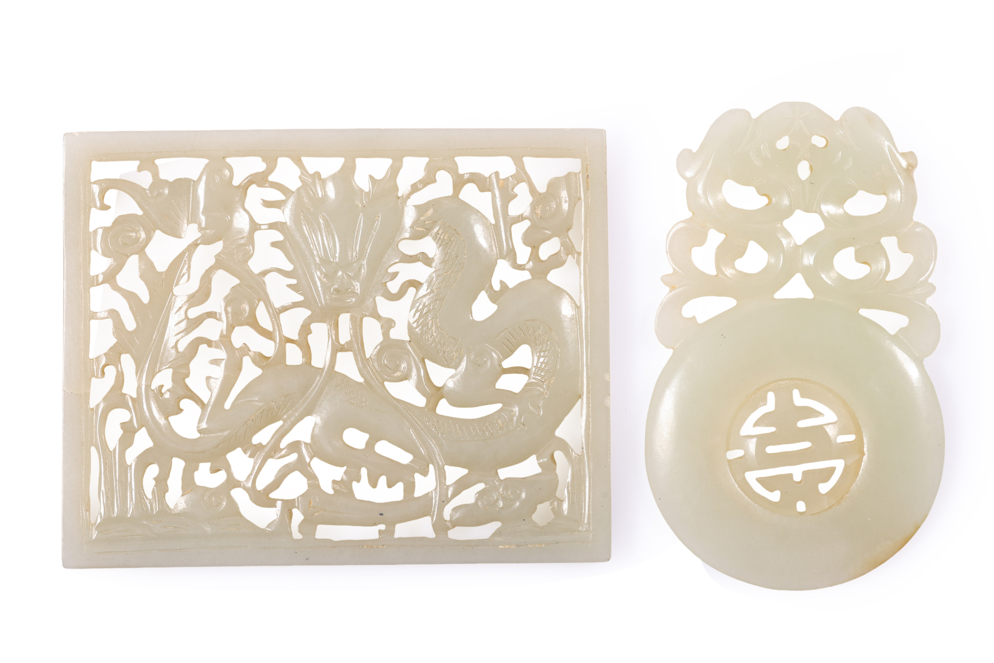 AN OPENWORK JADE DRAGON PLAQUE AND A JADE PENDANT