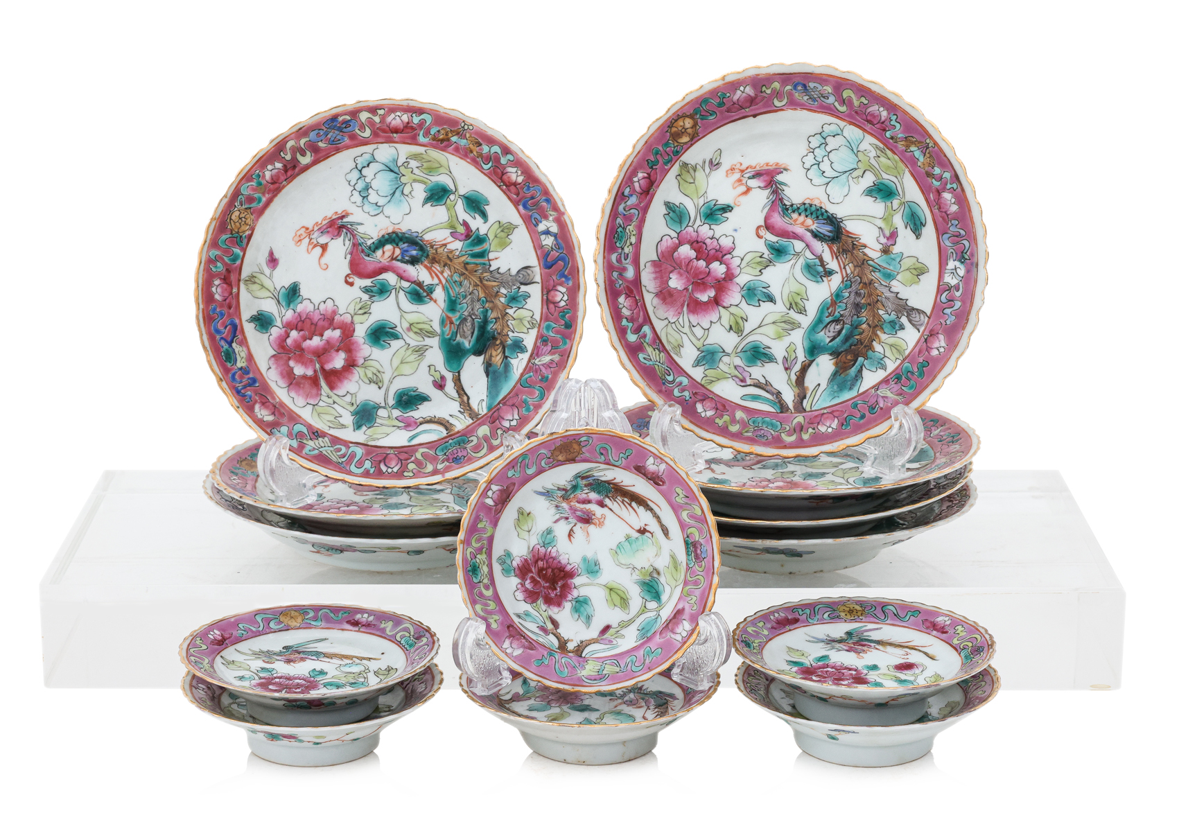 A GROUP OF 13 FAMILLE ROSE PHOENIX AND PEONY DISHES