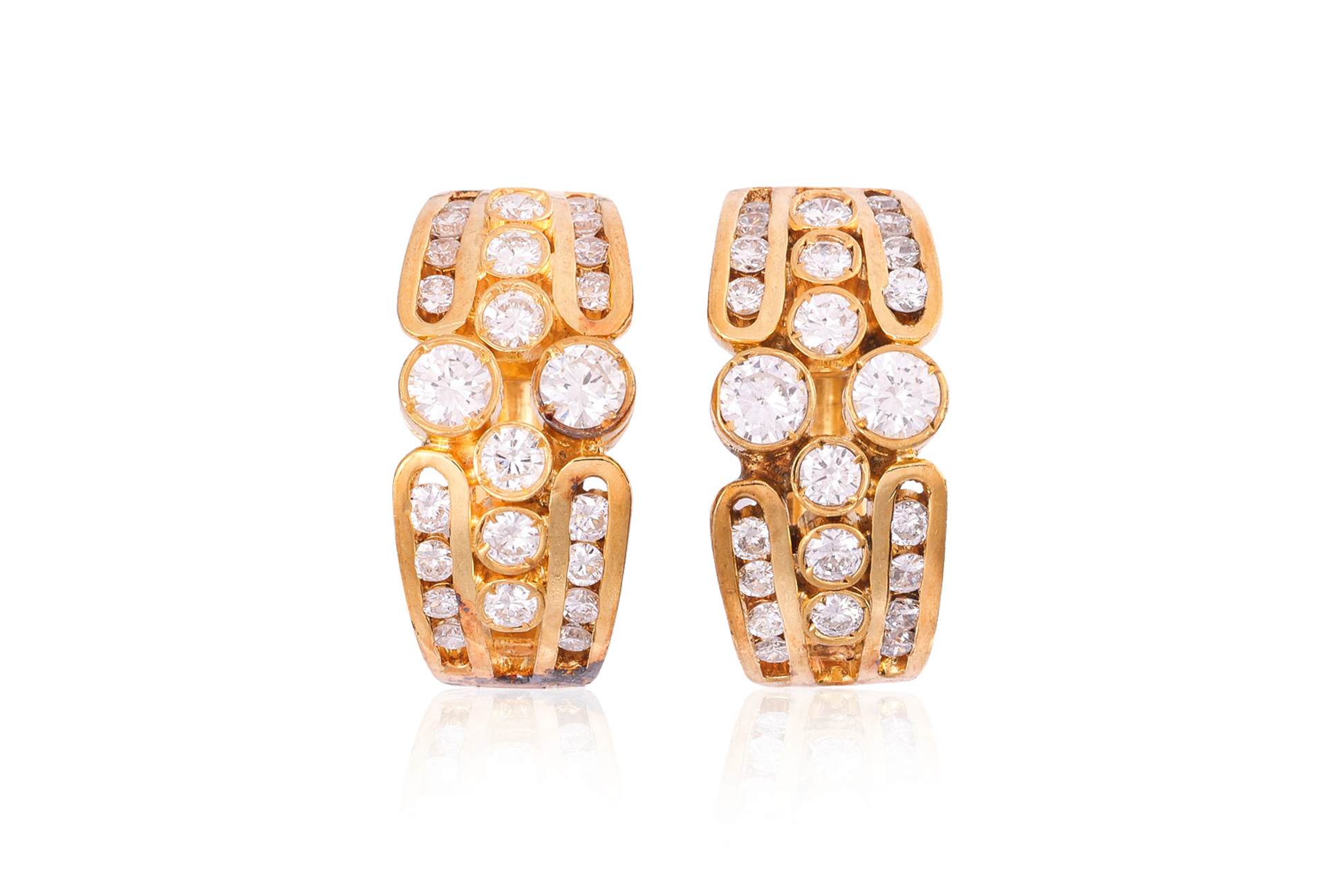 A PAIR OF DIAMOND HOOP EARRINGS