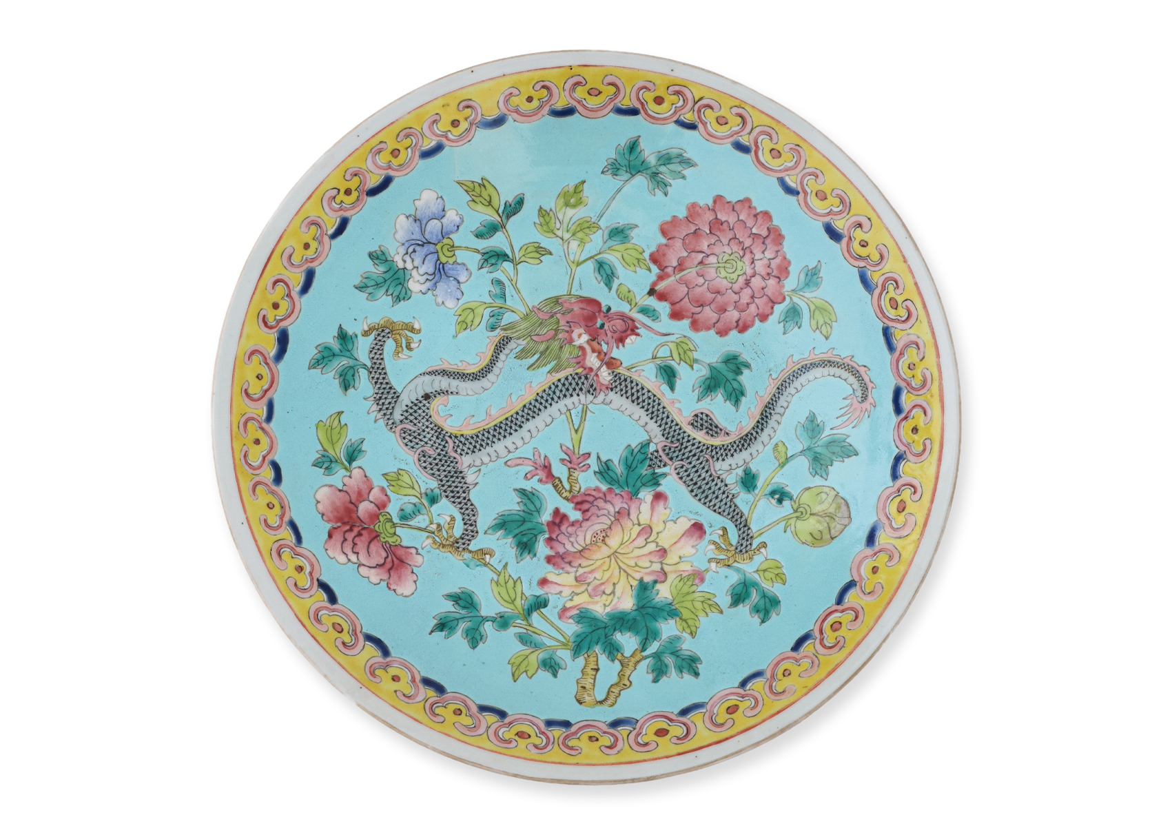 A LARGE TURQUOISE GROUND DRAGON AND PEONY DECORATED DISH