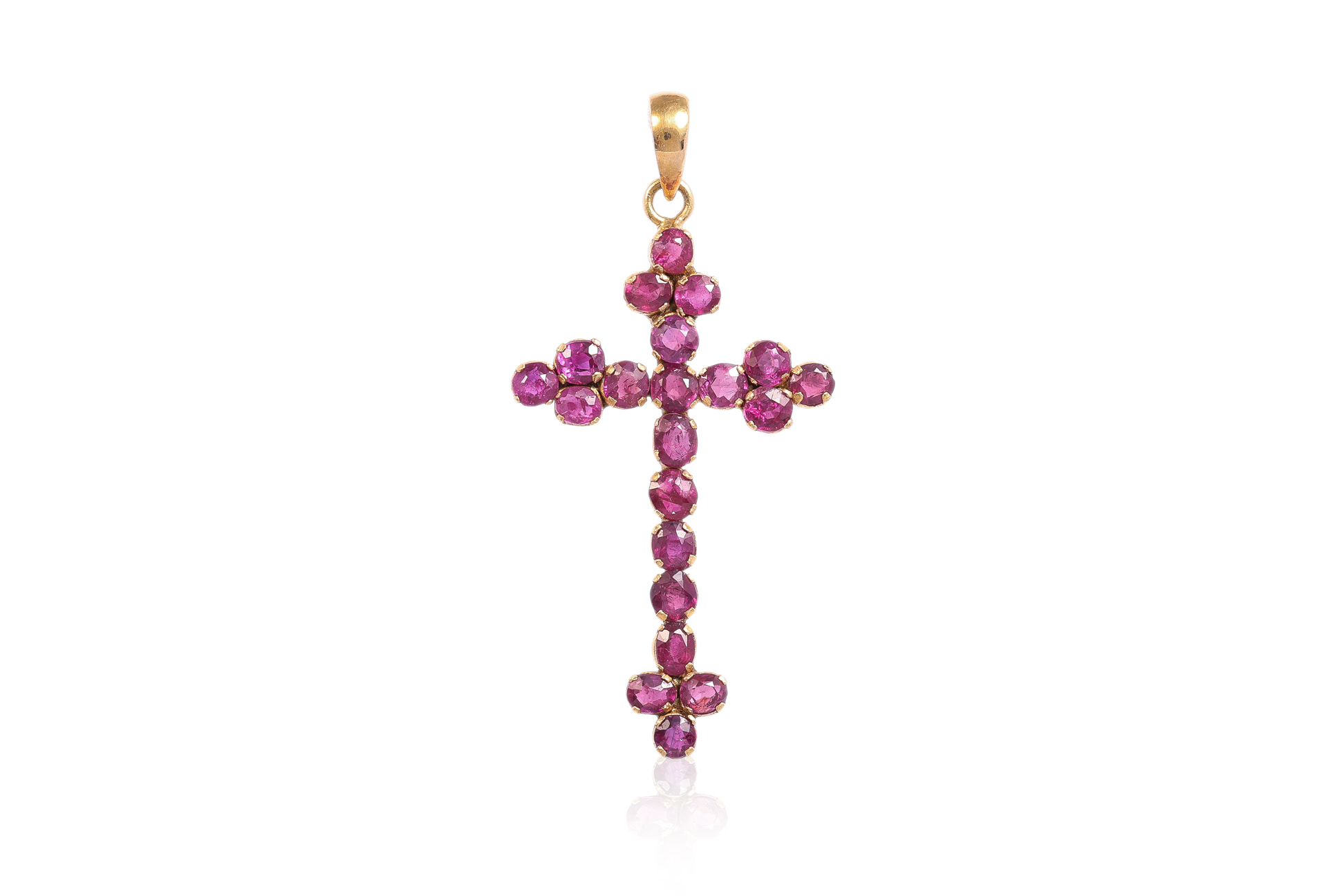 A GOLD AND RUBY CROSS PENDANT