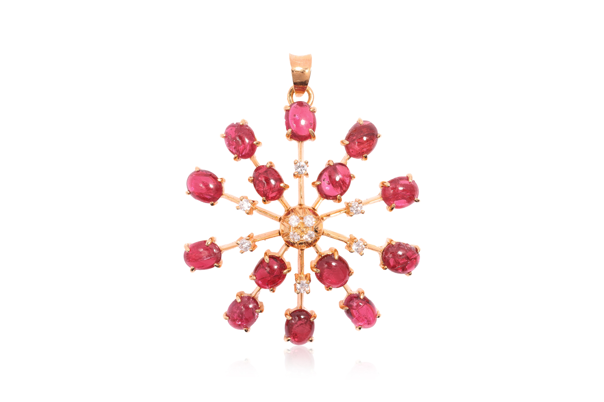 A RUBY AND DIAMOND 'STARBURST' PENDANT