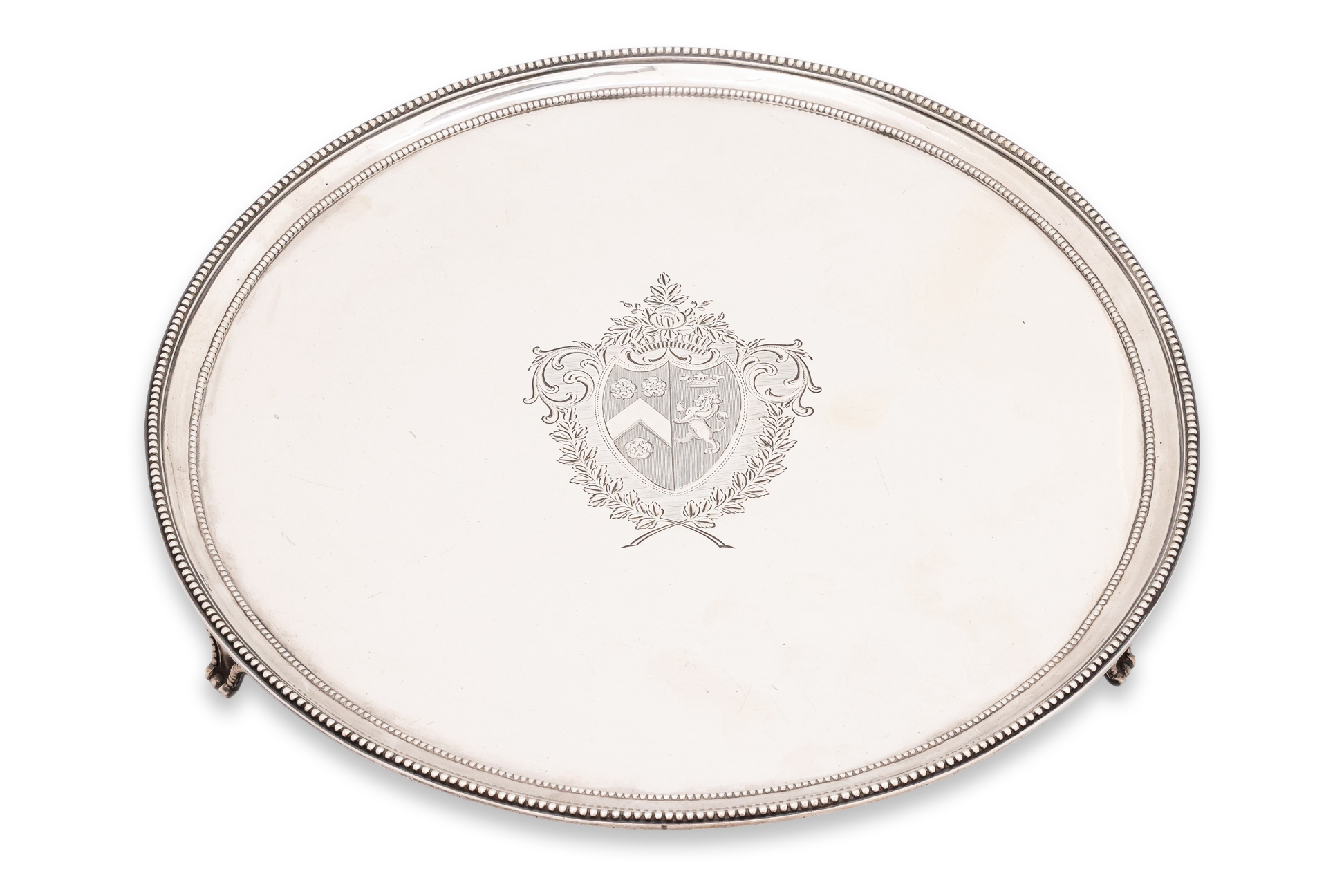 A GEORGE III CIRCULAR SILVER SALVER