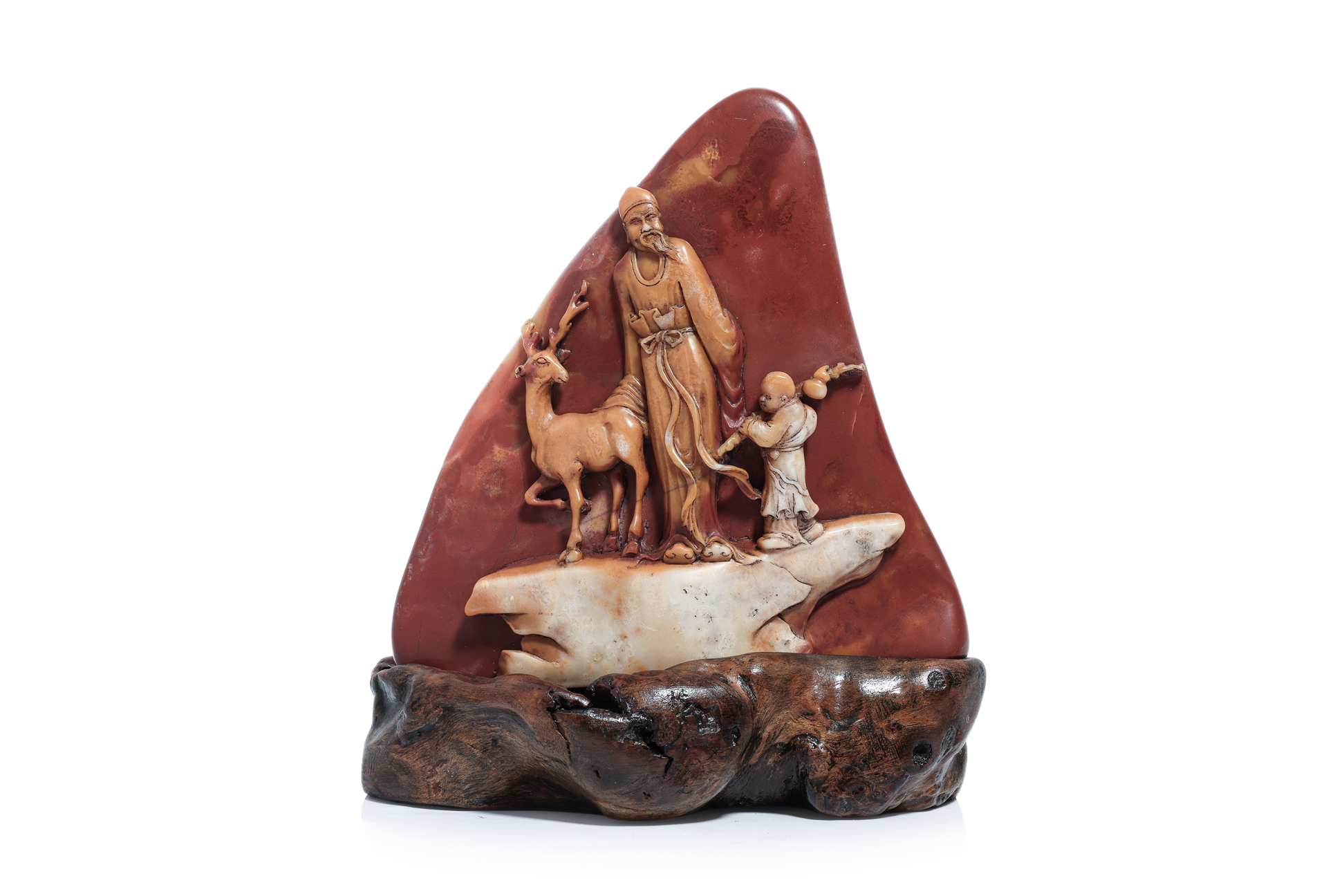 A SHOUSHAN SOAPSTONE CARVING OF SHOULAO WITH DEER AND ATTENDANT