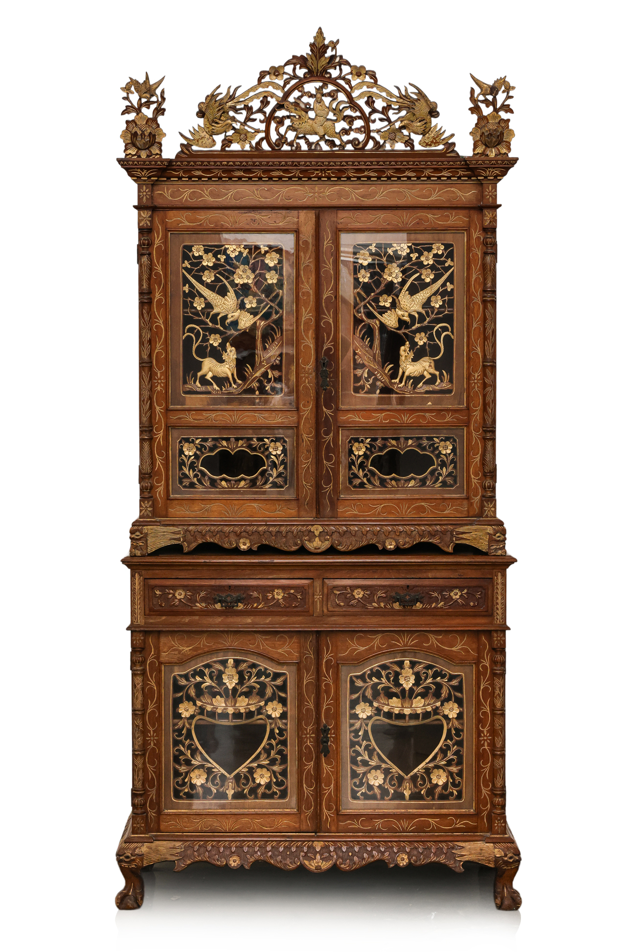 AN IMPRESSIVE CARVED AND PARCEL-GILT TEAK CABINET