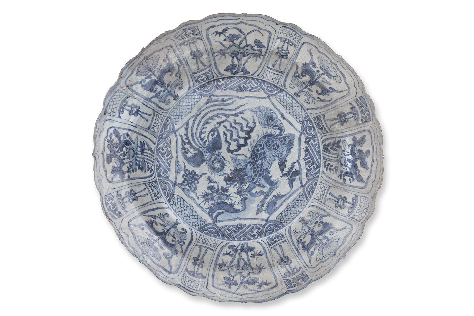 A LARGE BLUE AND WHITE KRAAK PORCELAIN 'QILIN AND PHOENIX' DISH