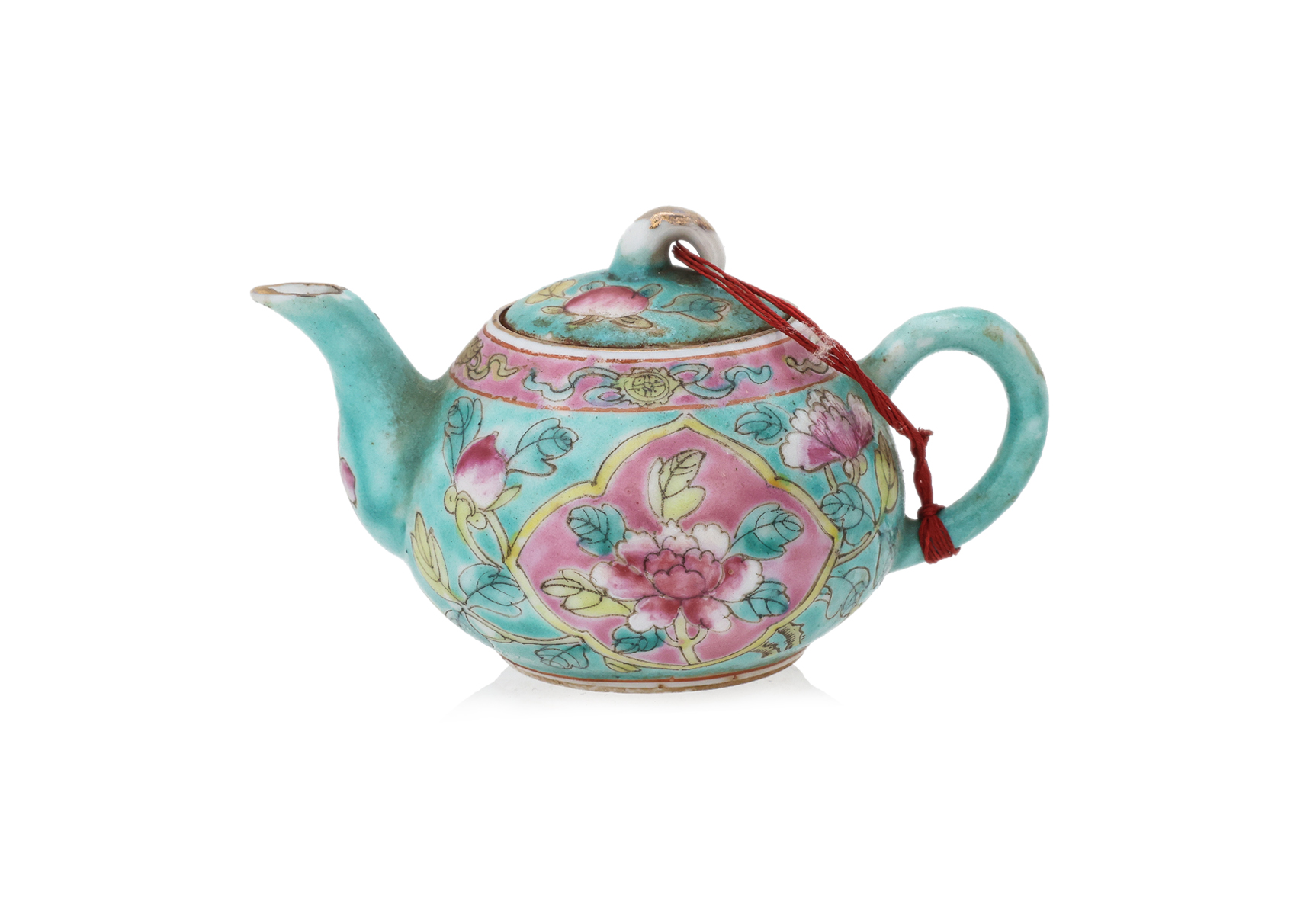 A FAMILLE ROSE TURQUOISE GROUND TEAPOT AND COVER