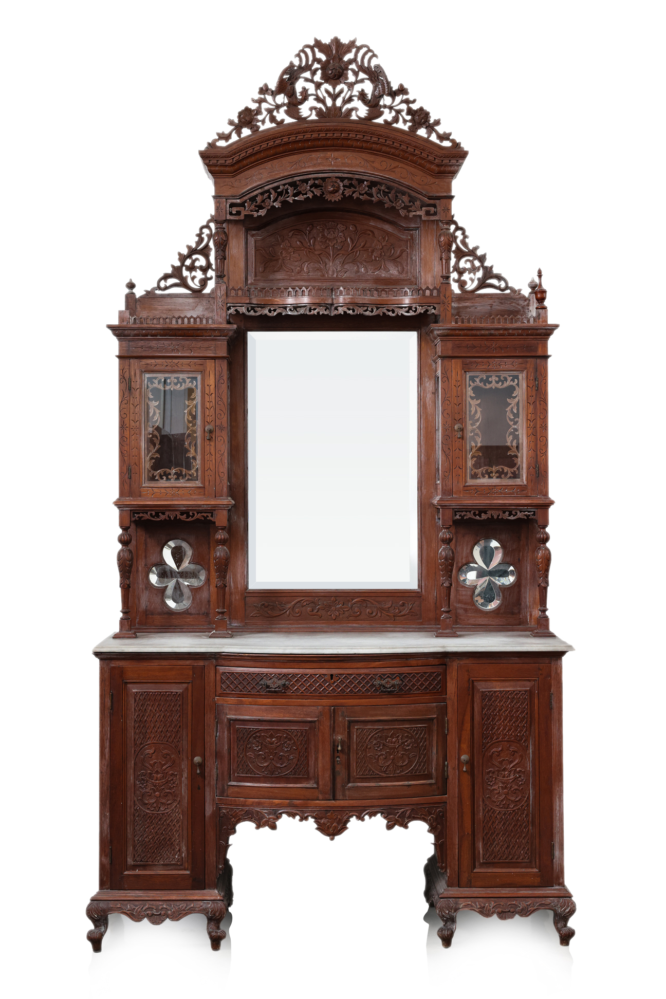 A LARGE CARVED TEAKWOOD SIDEBOARD