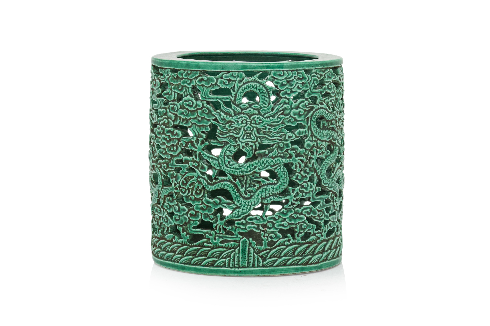 A GREEN-GLAZED RETICULATED DRAGON BRUSH POT