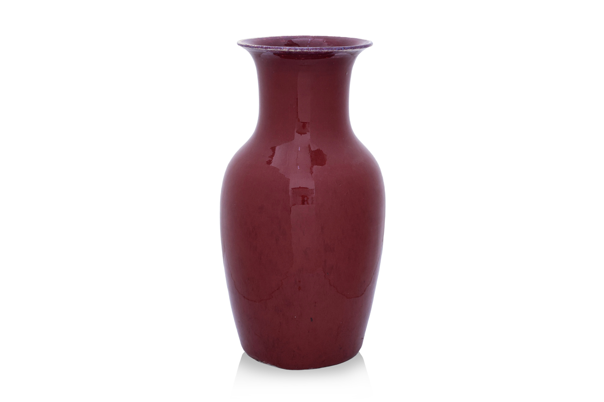 A SANG-DE-BOEUF GLAZED PORCELAIN VASE