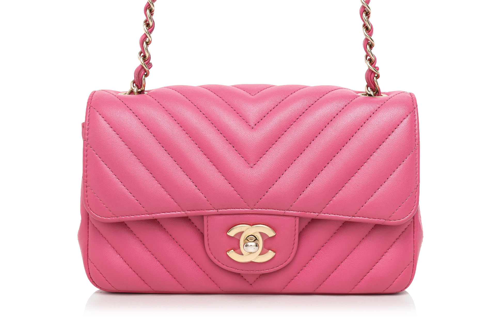 CHANEL - A PINK CHEVRON FLAP MINI BAG