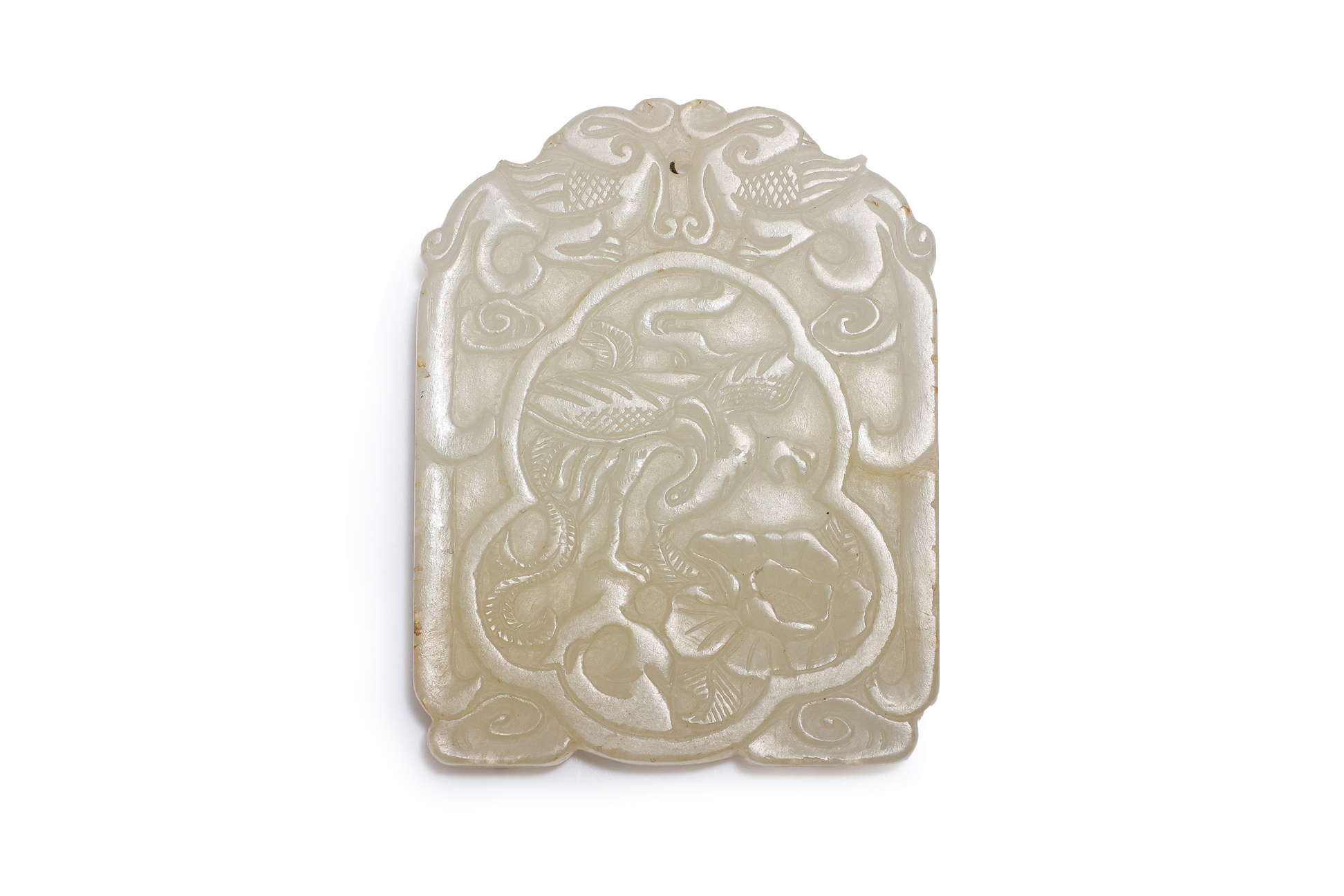 A CARVED WHITE JADE PLAQUE
