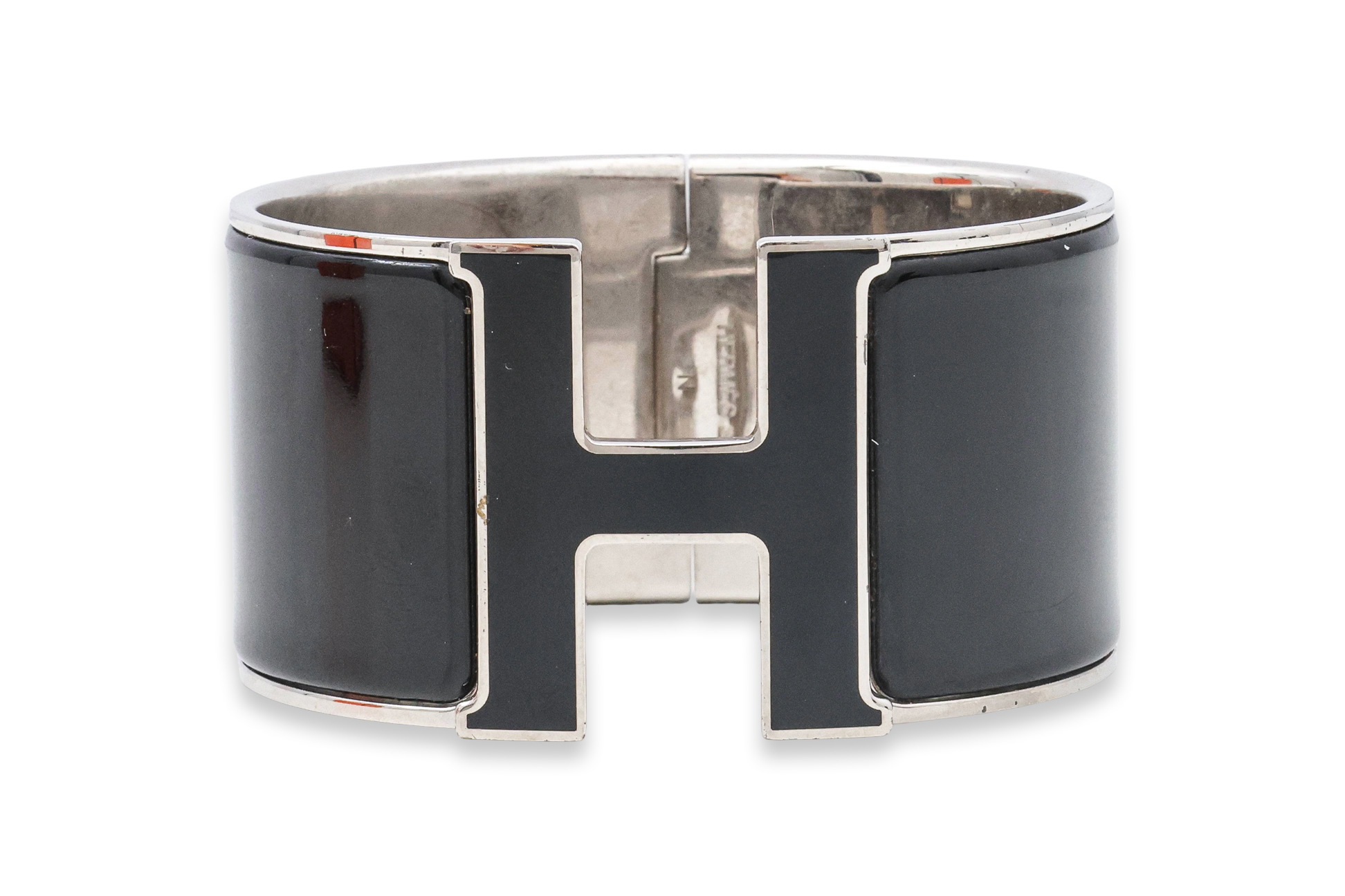 HERMÈS - A 'CLIC CLAC' H BRACELET IN BLACK ENAMEL