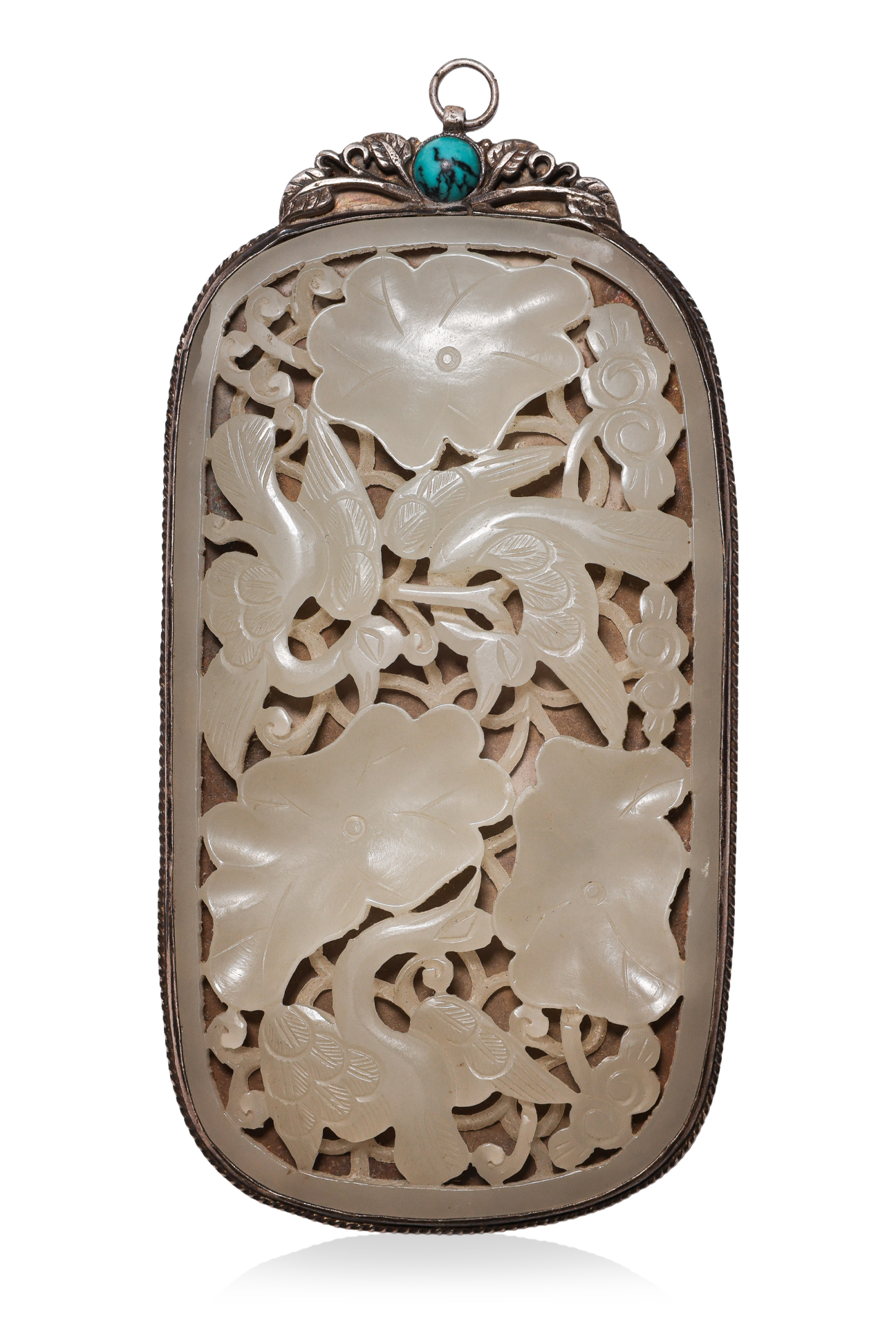 A WHITE JADE OPENWORK PLAQUE WITH SILVER MOUNT