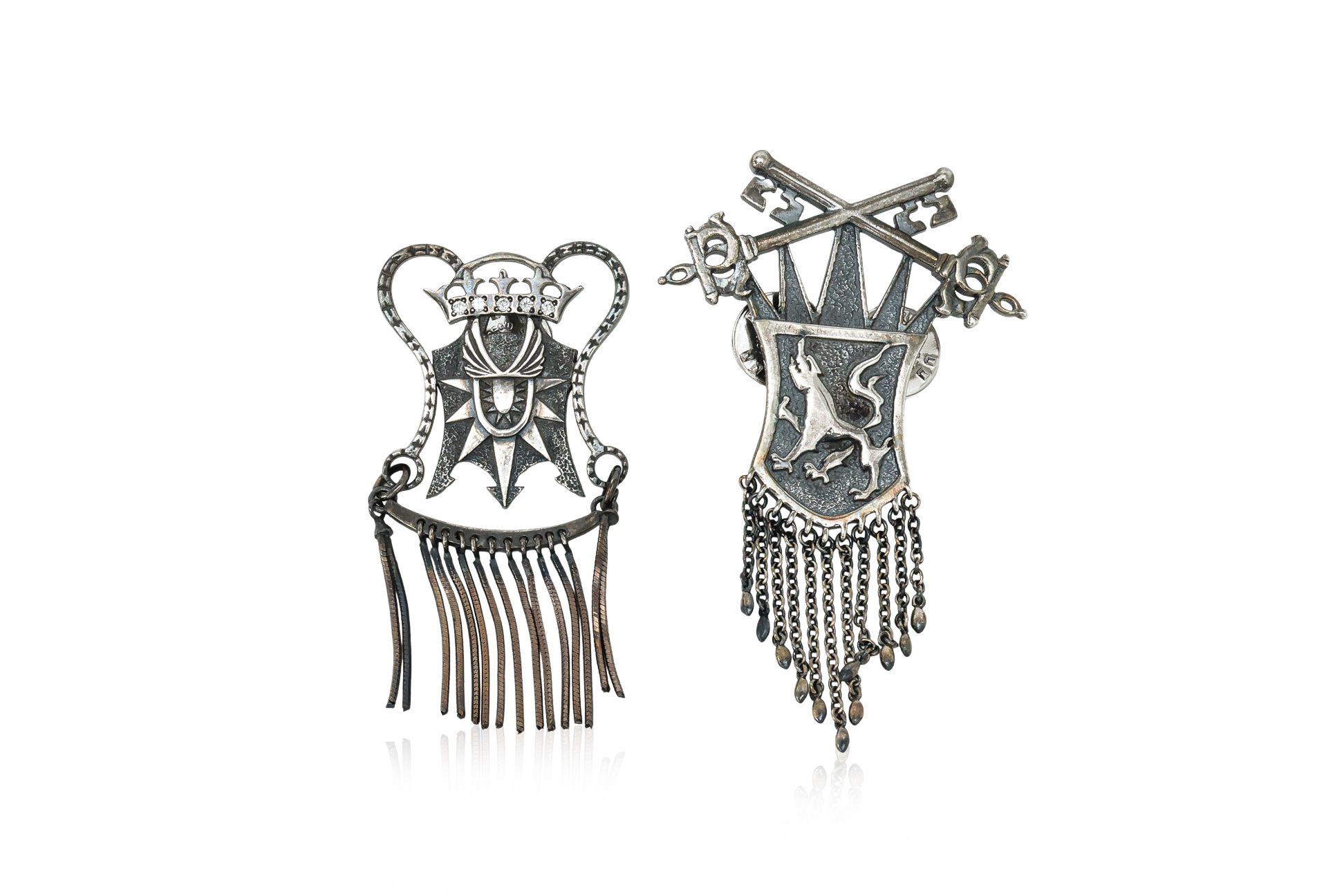 YOHJI YAMAMOTO - A PAIR OF METAL BROOCHES