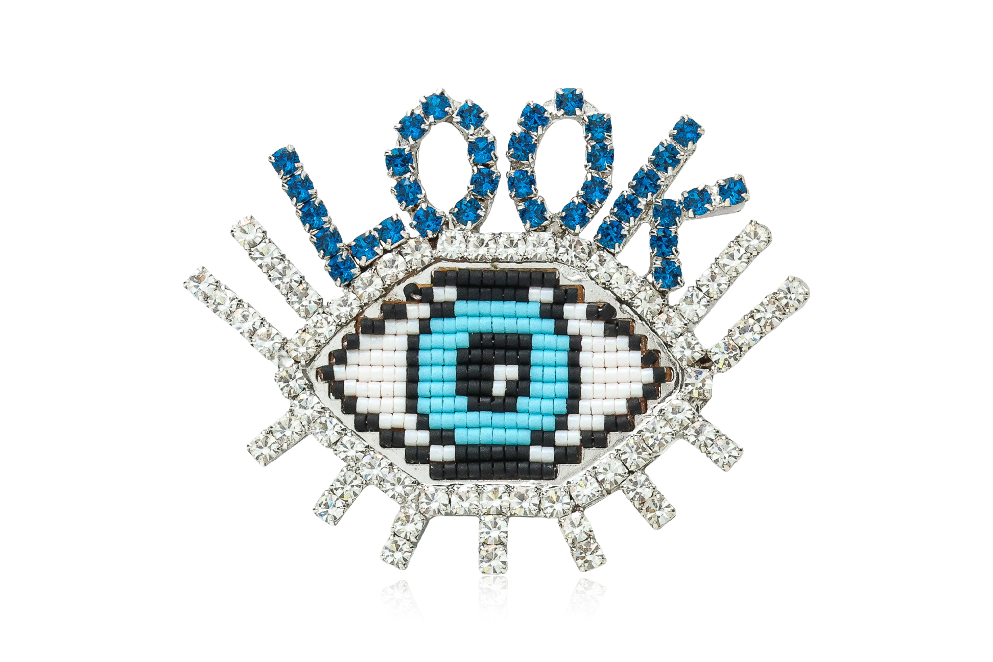 SHOUROUK - A SWAROVSKI CRYSTAL 'LOOK' EYE BROOCH
