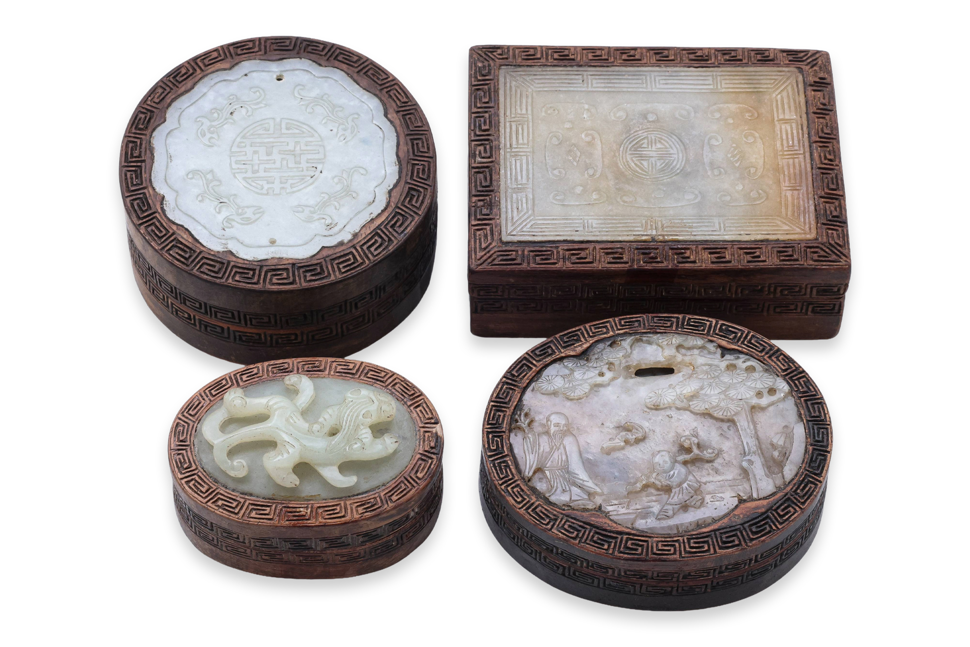 A GROUP OF FOUR HARDWOOD BOXES WITH JADE INSET COVERS