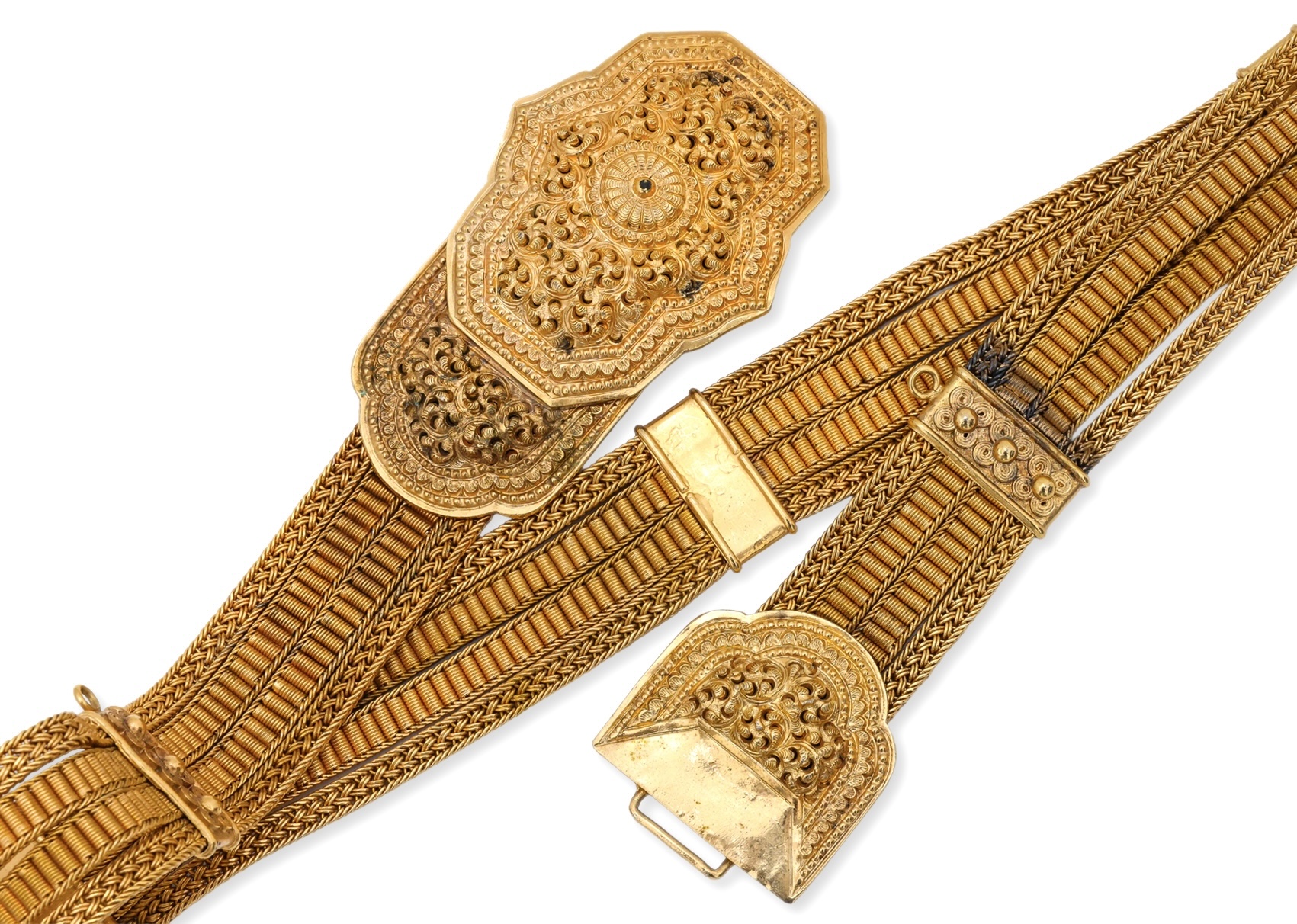 A SILVER-GILT BELT AND TRI-FORM BUCKLE