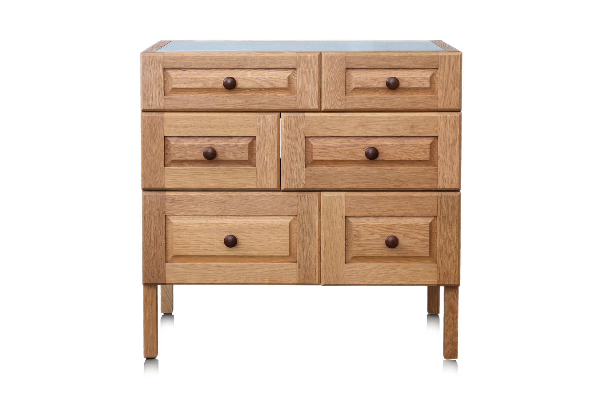 AN OAK CHEST OF DRAWERS BY NATHAN YONG