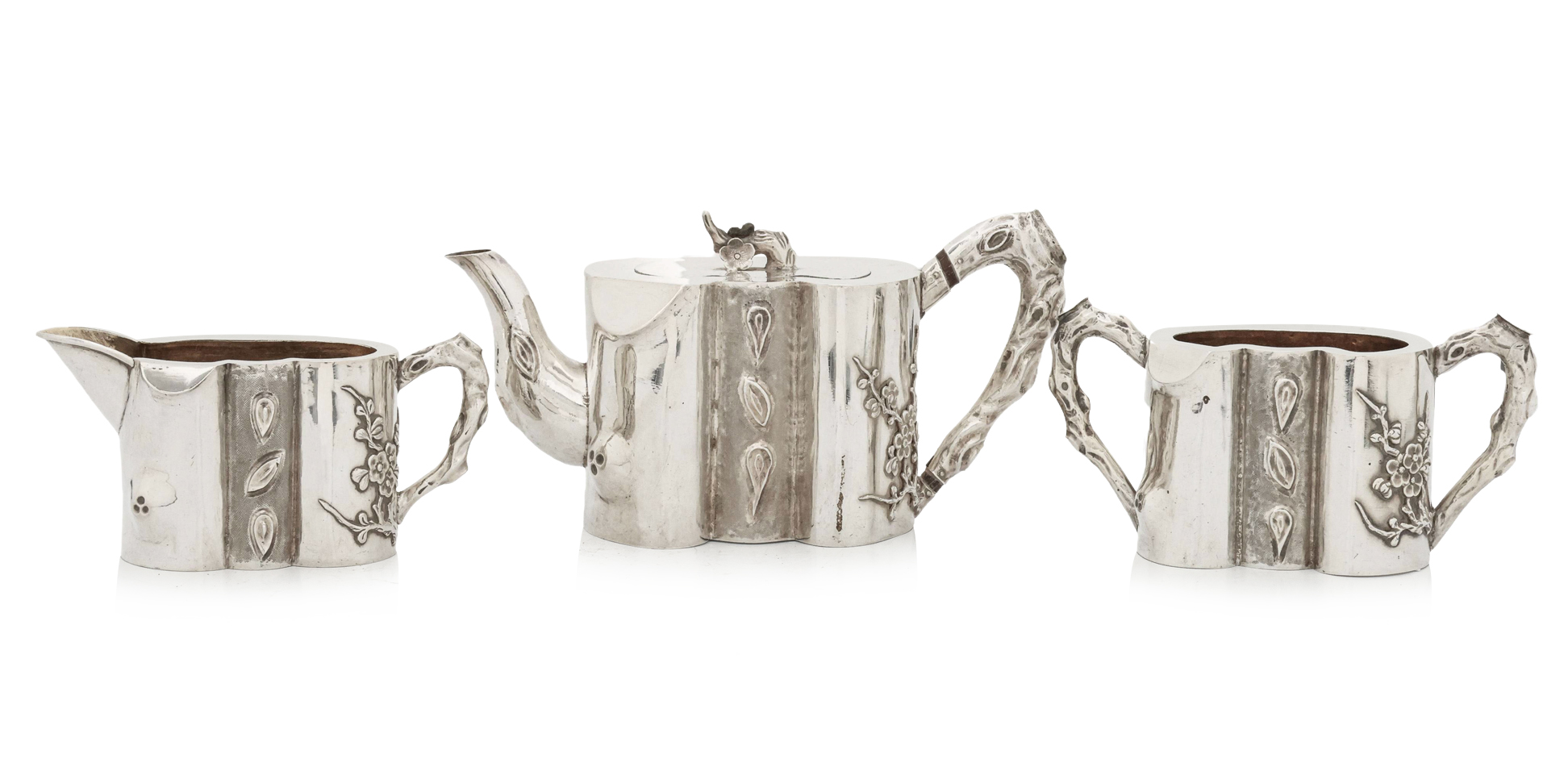 A CHINESE EXPORT SILVER THREE PIECE TEA SERVICE