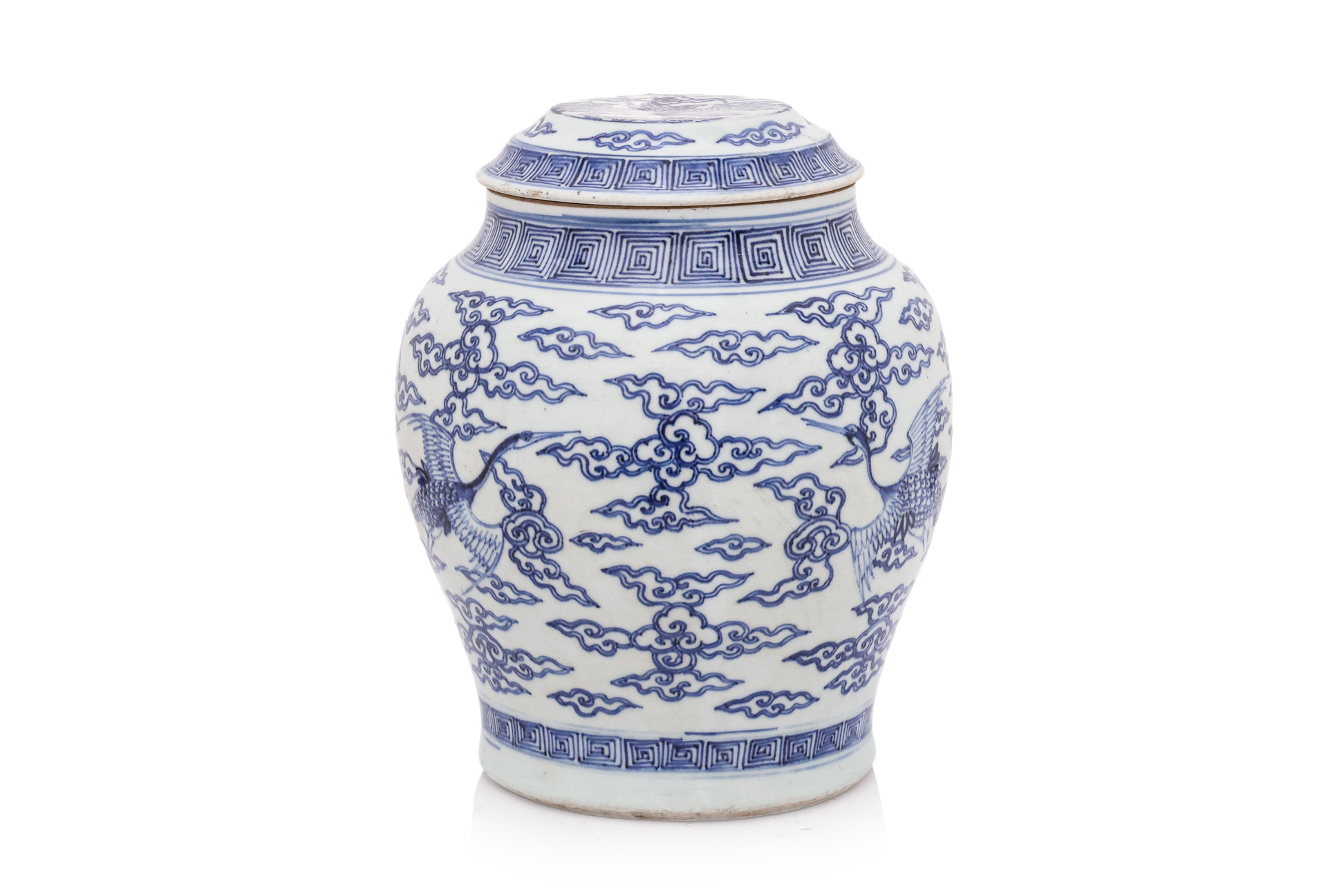 A BLUE AND WHITE CRANE DECORATED JAR AND COVER