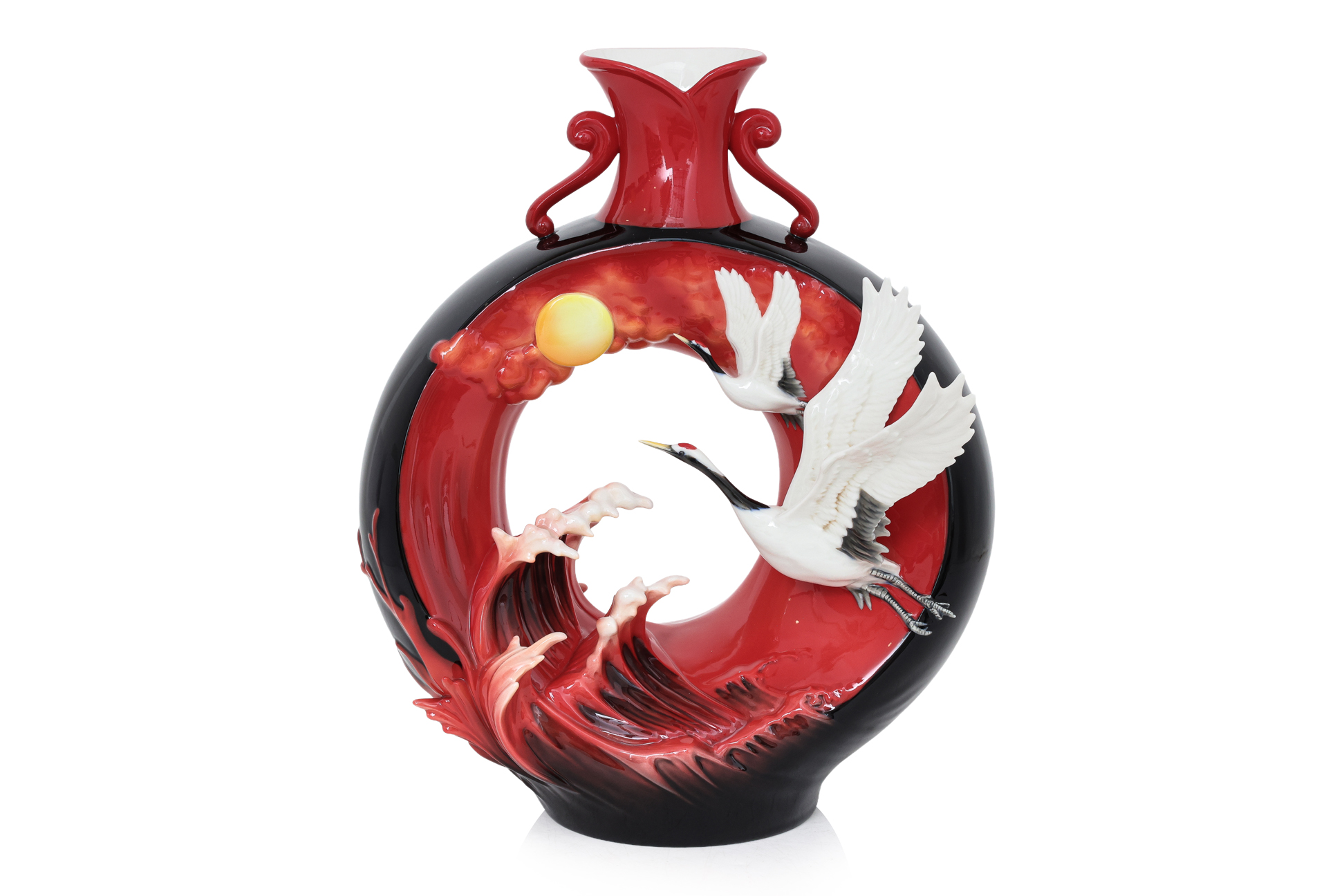A LARGE FRANZ CRANES WITH WAVES AND SUN PORCELAIN VASE