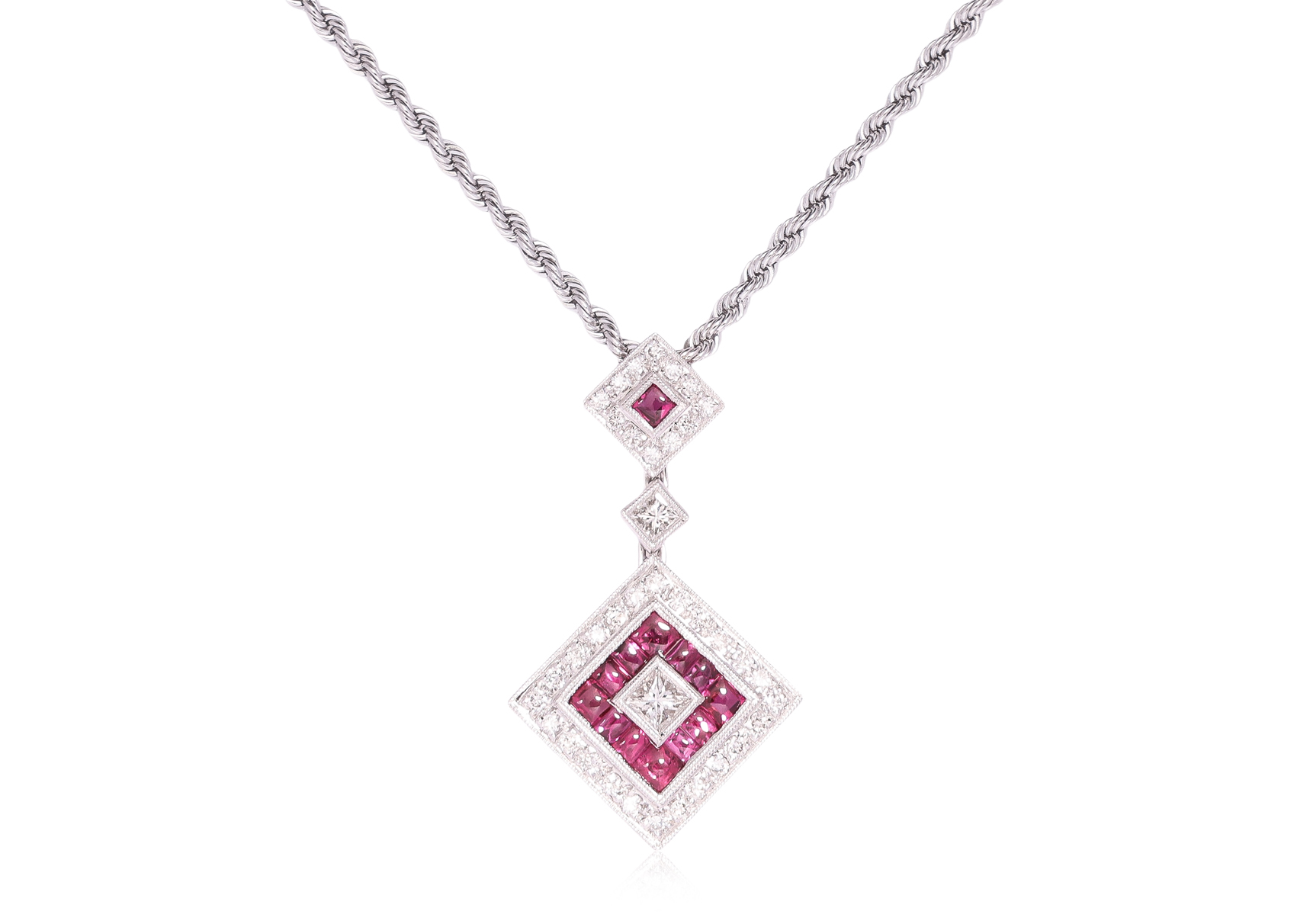 A RUBY AND DIAMOND PENDANT ON CHAIN