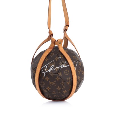 LOUIS VUITTON - A FRANCE 1998 WORLD CUP SOCCER BALL ACCOMPANIED BY REBONDS BOOK LOT 1.jpg