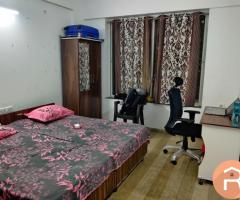 male single-sharing room in a furnished 2BHK in Hinjewadi