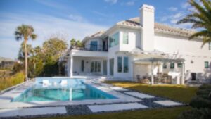 What Makes a Pool Deck Safe and Stylish with Pavers?