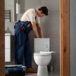 male plumber working fix problems client s house1